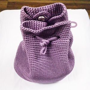 The Sak purple crocheted backpack.